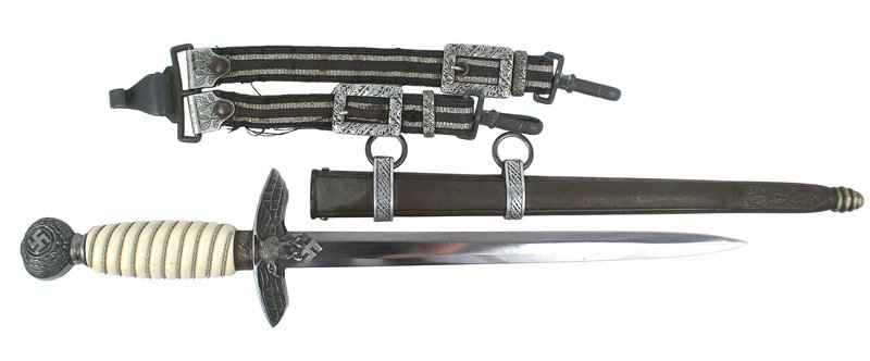 German WWII Luftwaffe 2nd Model dagger: D-18 German WWII Luftwaffe 2nd Model officer's dagger-with a silver wire wrapped white grip. Clean 10 3/8" blade has been buffed. Aged patina on pommel, crossguard and scabbard. Some wear to the cloth
