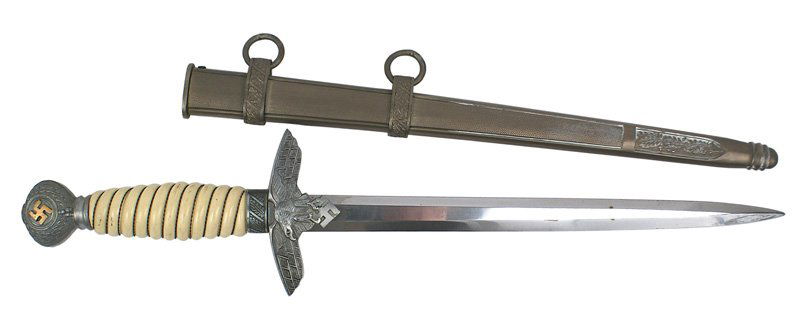 German WWII Luftwaffe 2nd Model dagger: D-19 German WWII Luftwaffe 2nd Model officer's dagger. Gilt swastika on pommel. Wire wrapped ivory celluloid grip. Clean unmarked blade. Patina on scabbard.II+