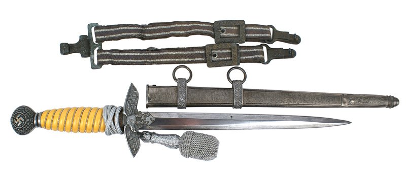 German WWII Luftwaffe 2nd Model dagger: D-20 German WWII Luftwaffe 2nd Model officer's dagger-with a yellow grip. Patina on fittings. "SMF -SOLINGEN" blade was improperly sharpened and buffed, leaving scratches. Darkened fittings and scabba