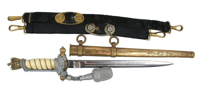 German WWII Navy officer dagger: D-22 German WWII Navy officer dagger. Gilt brass eagle/swastika pommel and rounded finials on crossguard (most of gilt remains)-with an anchor in the center panel. Braided gilt wire wrapped off-white 