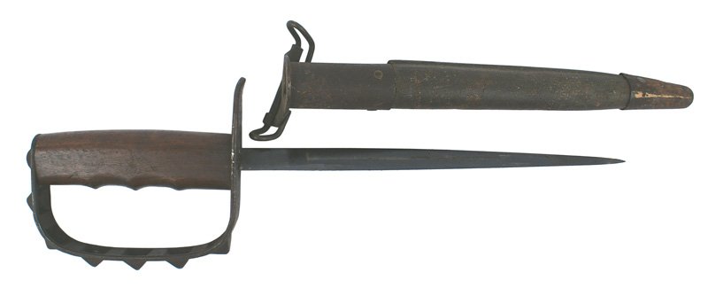 U.S. WWI M1917 trench knife: D-41 U.S. WWI M1917 trench knife. Marked "U.S. LF. + C. 1917". 9 1/8" dark blued triangular blade in excellent condition. Dark green leather scabbard with metal tip (light rusting). II+
