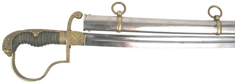Imperal German Artillery officer sword: D-55 Imperal German officer's Artillery sword. One-piece brass lion head pommel/baskstrap. Reverse "P" knucklebow with an Iron Cross /group of swords and floral work. Langet with crossed cannons/oak l