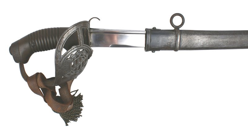 Imperial Saxon M1889 Cavalry Sabel sword: D-56 Imperial Saxon M1889 Cavalry "Sabel". Custom ordered. Large open work basket guard with a crowned state coat-of-arms within a laurel wreath (split at bottom). Excellent 1 1/4" wide, 31" quill-bac