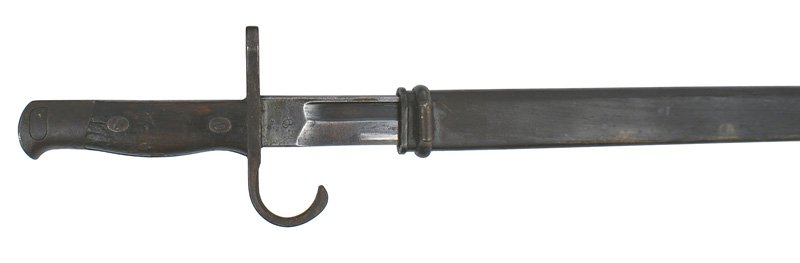 Japanese Arisaka M1897 bayonet: D-96 Japanese Arisaka M1897 bayonet. Steel pommel and "hooked" guard/"muzzle ring". Wood grips. 15 1/2" blade. Dark fittings, grip and scabbard. Some bluing left on the graying blade. Kokura Arsenal m