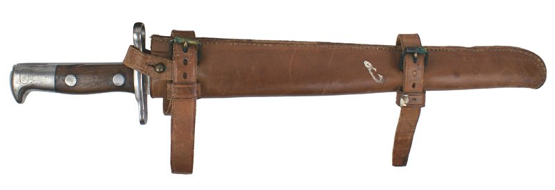 U.S. Krag M1892 bayonet: D-110 U.S. Krag M1892 bayonet. Clean steel pommel and crossguard with a muzzle ring. About excellent 11 1/2" blade marked "U.S." and "1898" (extreme tip was flattened). Cavalry type brown leather scab