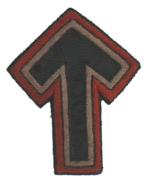 German WWII SA Tyr Rune Leadership School: H-71 German WWII SA Tyr Rune for graduates of the National Leadership School. Black broad arrow, bordered in white on a red field. II