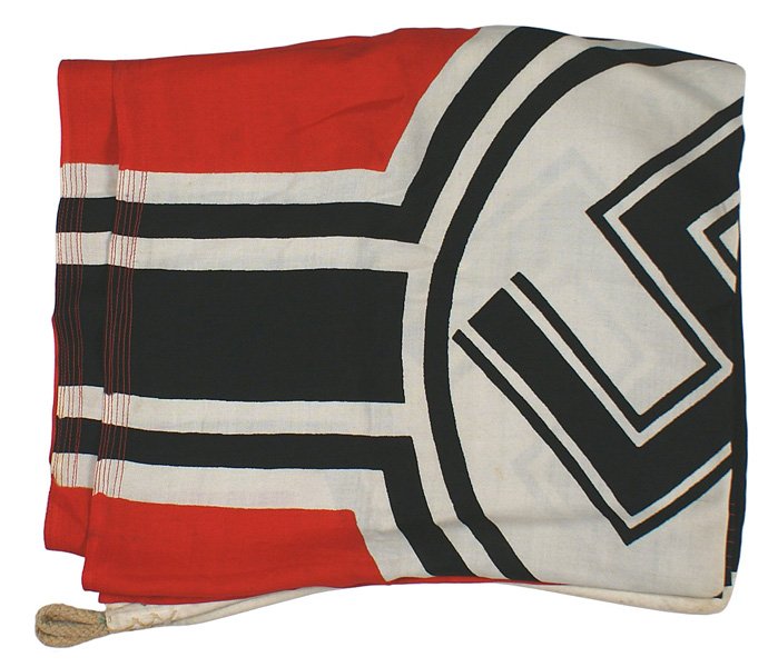 German WWII Navy Kriegsflagge flag: H-86 German WWII Navy "Kriegsflagge". Black swastika within a white circle with white and black strip dissected panels-all on a red field. Black Iron Cross in upper left corner. Sleeve is marked "LOH.
