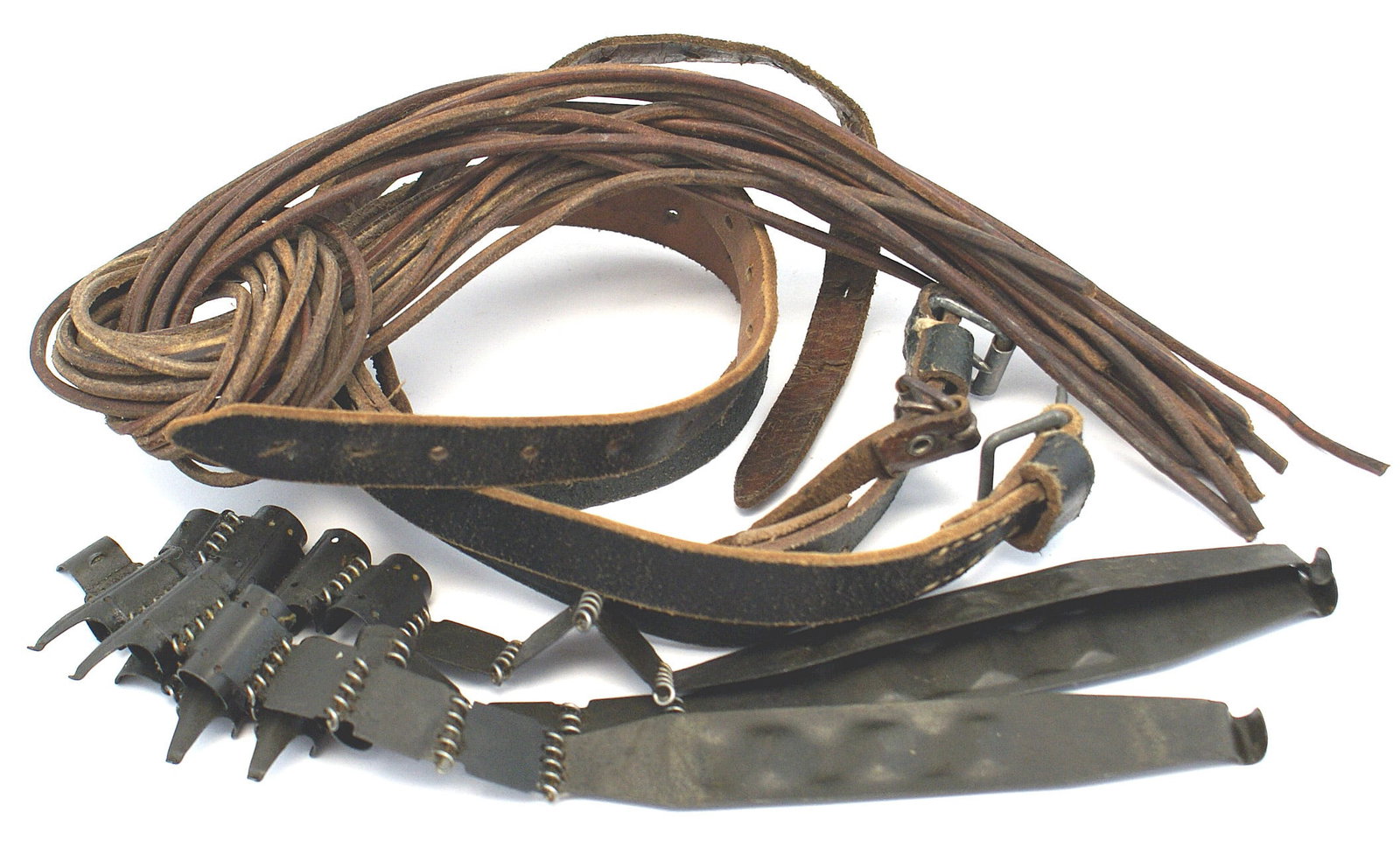 German WWII military lot starter tabs laces: M-049 German WWII military lot: (1) Three MG 34/42 starter tabs with short chain. (2) Three leather equipment straps. (3) Ten leather laces for ankle boots. II