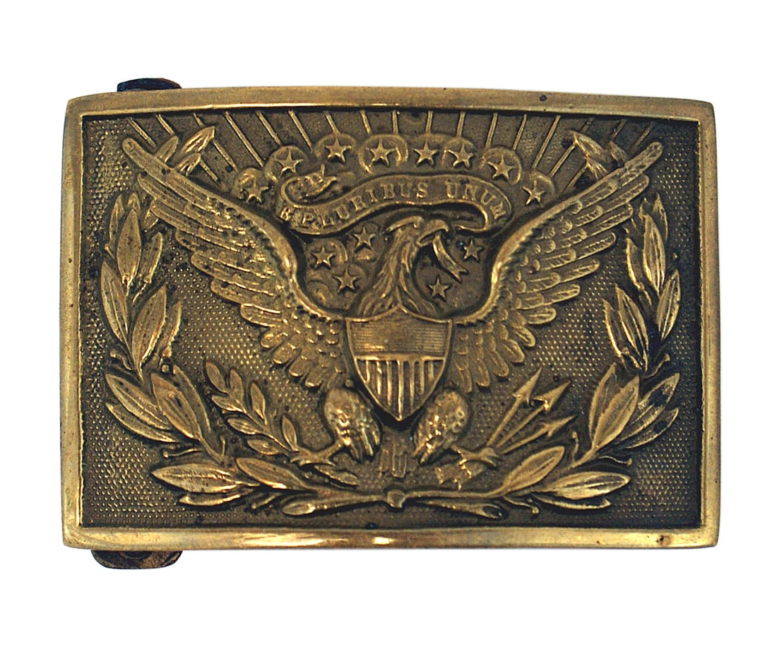 US Indian Wars era brass buckle: K-035 U.S. Indian Wars era brass buckle. Relief spread-wing eagle/American shield within a laurel wreath. Slightly convex. 2" x 2 3/4" .Reverse maker marked "HORSTMANN". Exactly like the Civil War iss