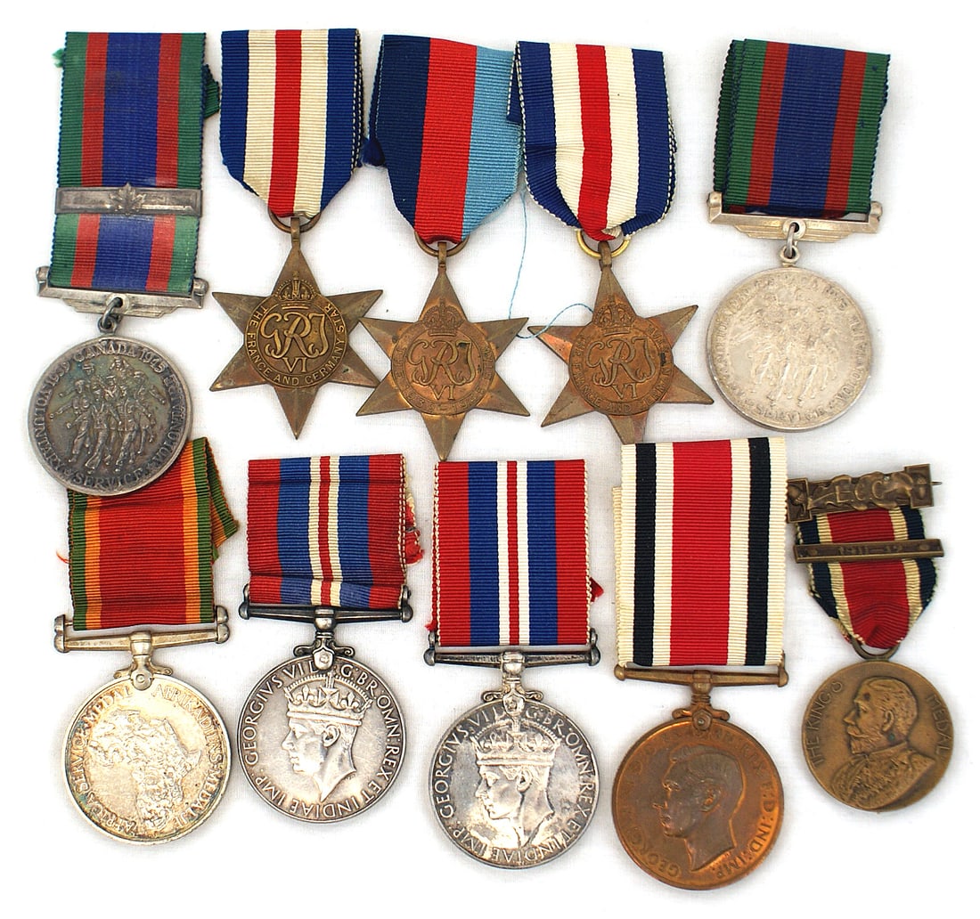 8 British Commonwealth Medals King George V: B-084 Lot of 8 British/Commonwealth Medals: (1) The King's Medal for service on the London Council. With pin back bar and a "1911-12" Service bar. (2) George V "FOR FAITHFUL SERVICE IN THE SPECIAL CON