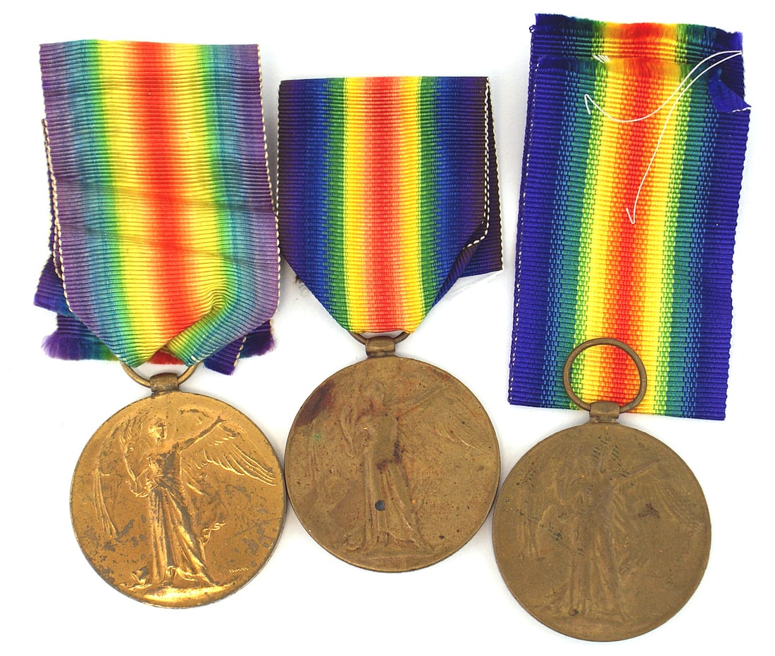 3 British WWI Victory Medals all named: B-090 Lot of 3 British WWI Victory Medals. All named on the rim. Includes: (1) "A.H.C. KEMSLEY - SIG.R.N." (Navy Signalman). (2) "SEPOY FAZEL. ILLAHI. 92 PJBIS" (92nd Punjab Infantry). (3) "LAL KHAN -