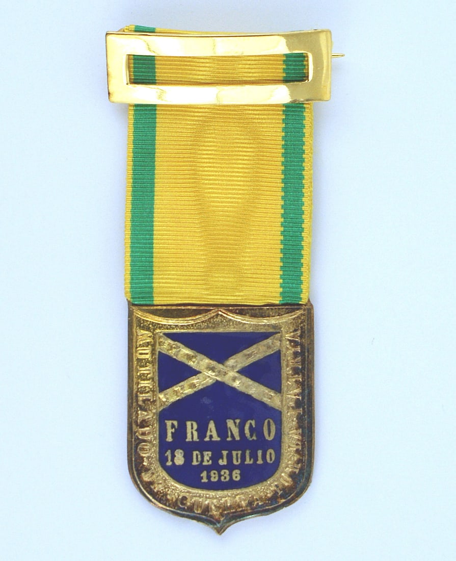 Spanish Severe Wounds Medal: B-104 Spanish Severe Wounds Medal. Gilt outlined shield and lettering "FRANCO - 18 DE JULIO 1936". I