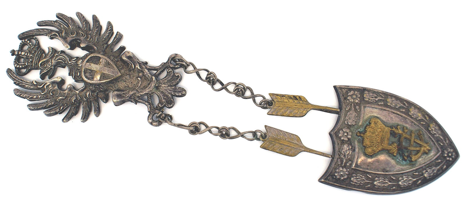 Italian officerbandolier cross belt accessories VE: F-049 Decorative embellishments for an Italian officer's dress bandolier cross belt. Includes a 4" x 2 1/2" relief silvered crowned eagle with a breast shield bearing a House of Savoy crest. Chains at
