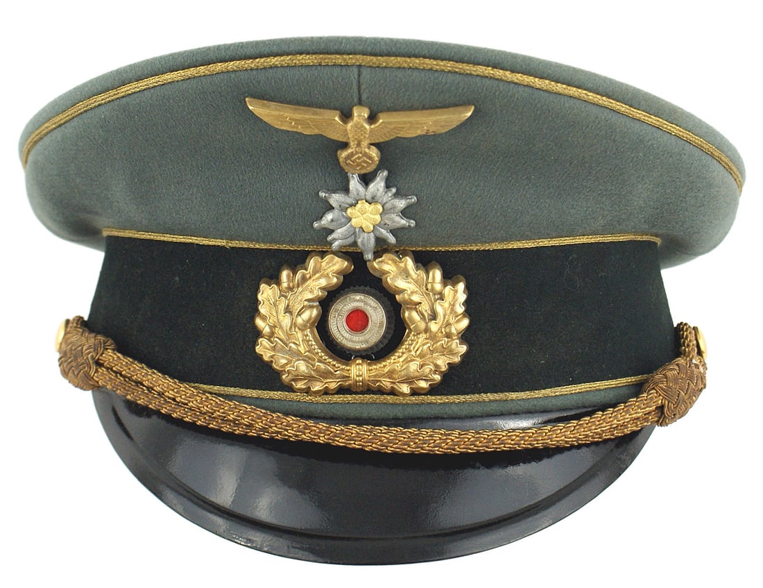 German WWII Army General Karl von Le Suire cap: A-013 Personal dress peaked cap of German WWII Army General Karl von Le Suire. Fine quality doeskin with gold wire cord piped dark green band and crown. Gilt eagle/swastika and oak-leaf wreath with an