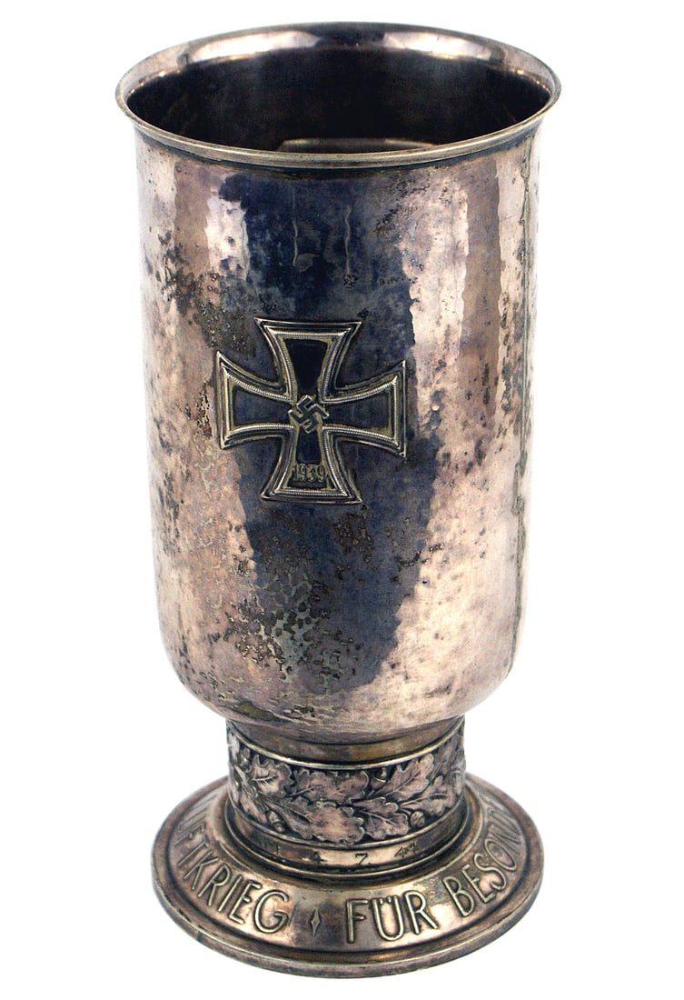 German WWII Luftwaffe silver Honor Pokal goblet: A-017 German WWII Luftwaffe silver "Ehrenpokal" awarded to a member of 7/Zerstorer - Geschwader 26 "Horst Wessel". Hammered silver Honor Goblet bearing an embossed panel of two eagles in combat. Rever