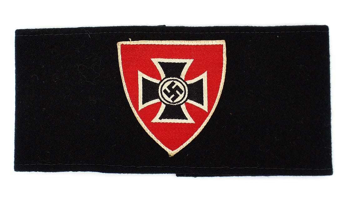 German WWII NS RKB War Veterans armband: H-021 Third-Reich NS-RKB (War Veterans Association) armband. Bevo embroidered shield with an iron Cross swastika. Black felt band. II
