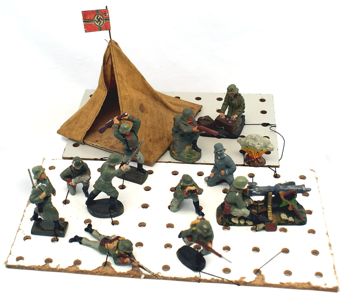 German WWII era lot of toy German soldiers: H-075 German Third-Reich era lot of 12 composition toy German soldiers. Six are maker marked "LINEOL - GERMANY". Included are an 08/15 machine gunner, rifleman, signalman, artillery spotter, and shell