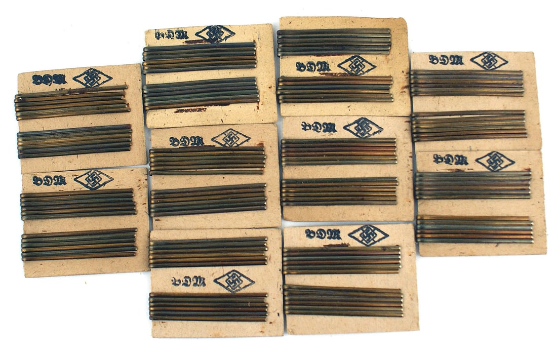 German WWII BDM Hitler Youth bobby pins: H-076 Lot of 10 BDM/Hitler Youth cards, with 12 each, bobby pins. Cards are stamped with the HJ diamond/swastika and "BDM". I