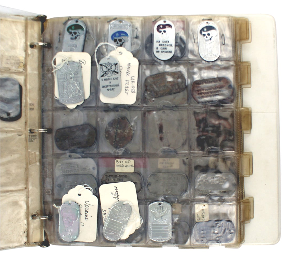 Collection of dog tags US Kit Carson Scouts: H-114 Collection of U.S. and miscellaneous "dog tags". Over 150 pieces including U.S. Army/Navy/Marine to include Viet-Nam specialty units - "MIKE FORCE" and four "Kit Carson Scouts" (a small number o