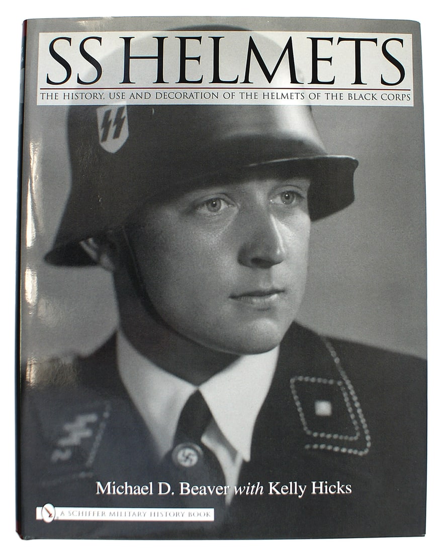 German WWII reference book SS HELMETS: I-041 SS HELMETS by Michael D. Beaver with Kelly Hicks. 198 large format pages. Photos of helmets used by the SS from 1935 to 1945 type of markings, and decals used. 2006 publication. With jacket. New