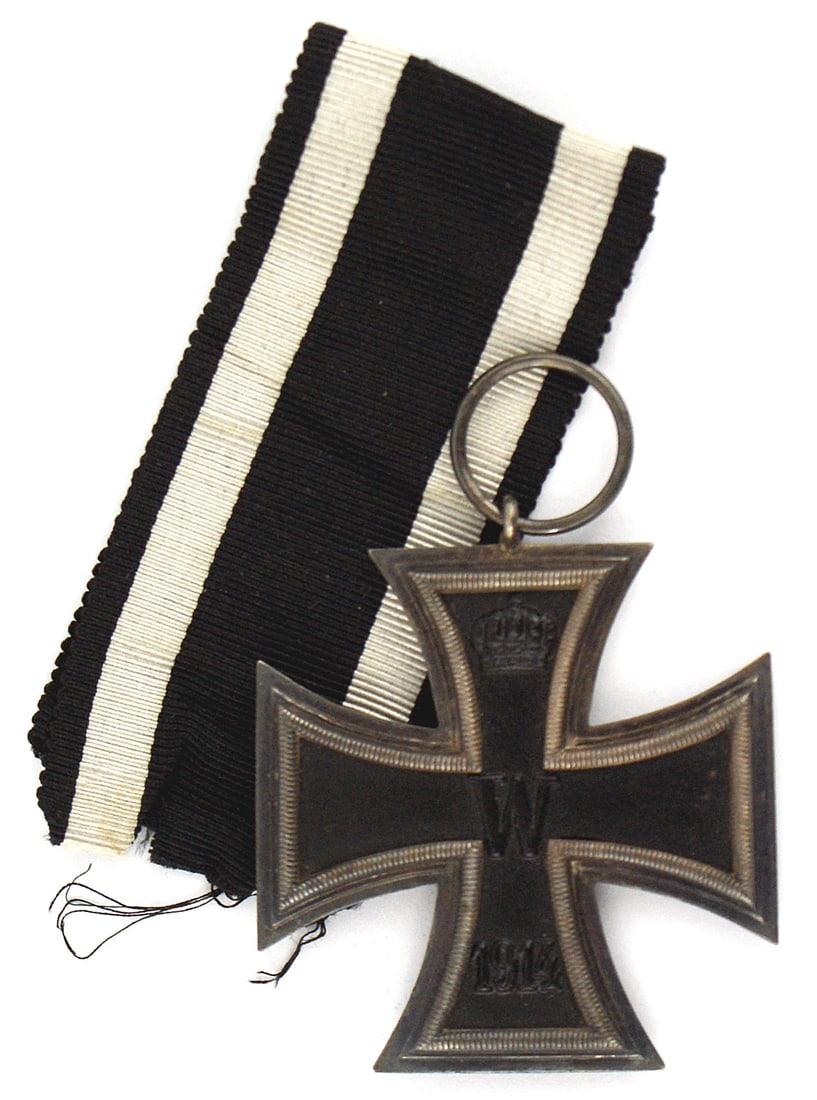 German WWI 2nd Class Iron Cross: B-014 German WWI 2nd Class Iron Cross. Relief crown, large "W" and "1914". Reverse: crown over "FW", oak leaves and "1813". Patina on the silver frame. Large suspension ring marked "M". With a proper 
