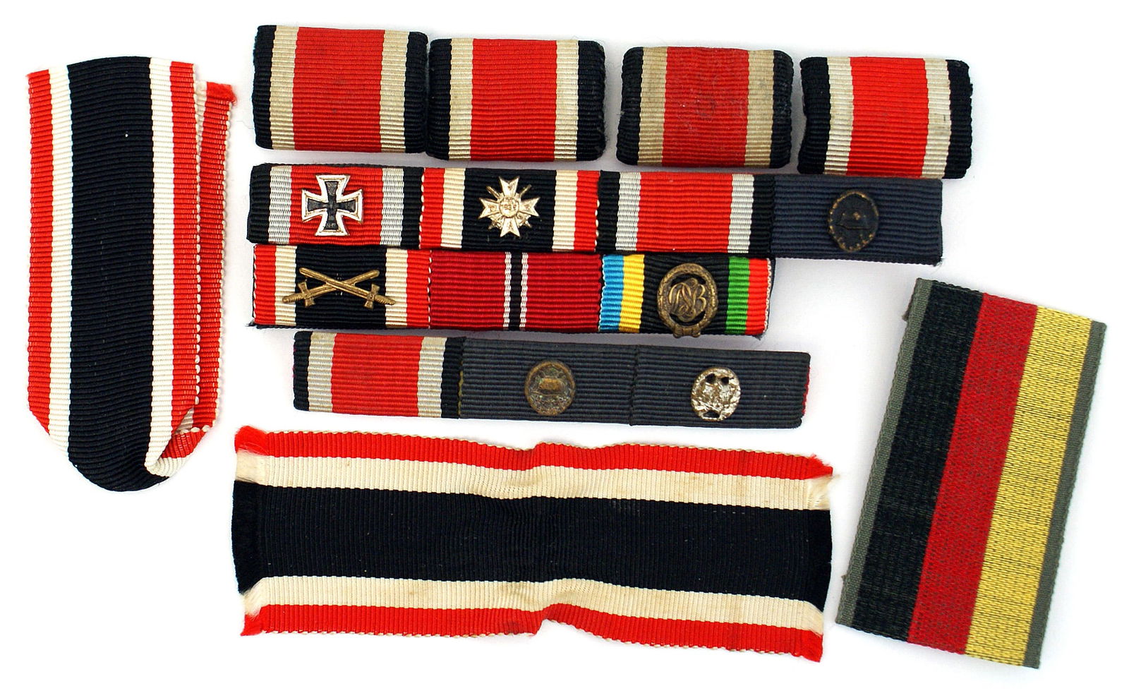 Lot of German ribbon bars and ribbons Third Reich/1957: B-094 Lot of German ribbon bars and ribbons: (1) Third-Reich originals - Four individual pin-back bars for the 1939 Second Class Iron Cross. (2) West German post-war ribbon bars - (A) 1939 2nd Class I