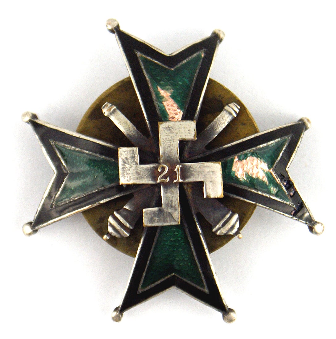 Polish WWII 21st Gorski Field Artillery Badge: B-111 Polish WWII 21st Gorski Field Artillery Regiment Badge. Variation swastika with "21" on a black bordered green enameled convex cross - with cannons between the arms. Screw-post on reverse with a