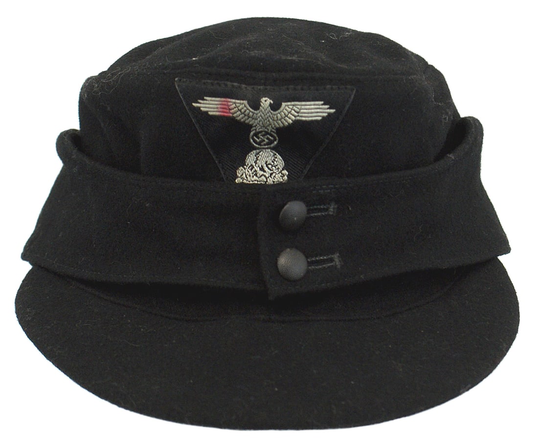 German WWII Waffen-SS Panzer field cap: E-050 German WWII Waffen-SS enlisted ranks black Panzer field cap. Machine sewn trapezoid insignia (W - SS eagle/swastika over a skull/crossbones). All black wool - rayon construction with a two - but