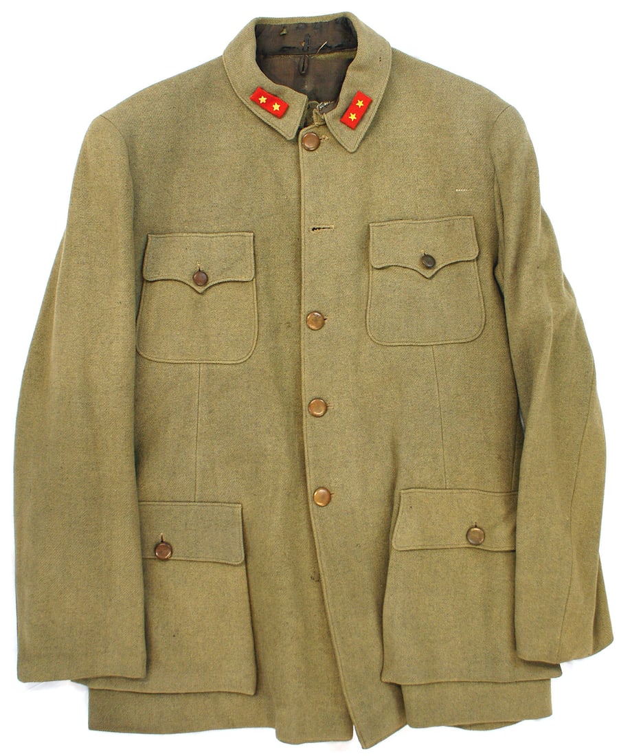Japanese WWII other ranks service tunic: F-023 Japanese WWII other ranks service tunic. Mustard /OD wool with four flap "patch" pockets. Private First Class collar tabs (two yellow stars on a red field). Five age toned brass buttons down fro