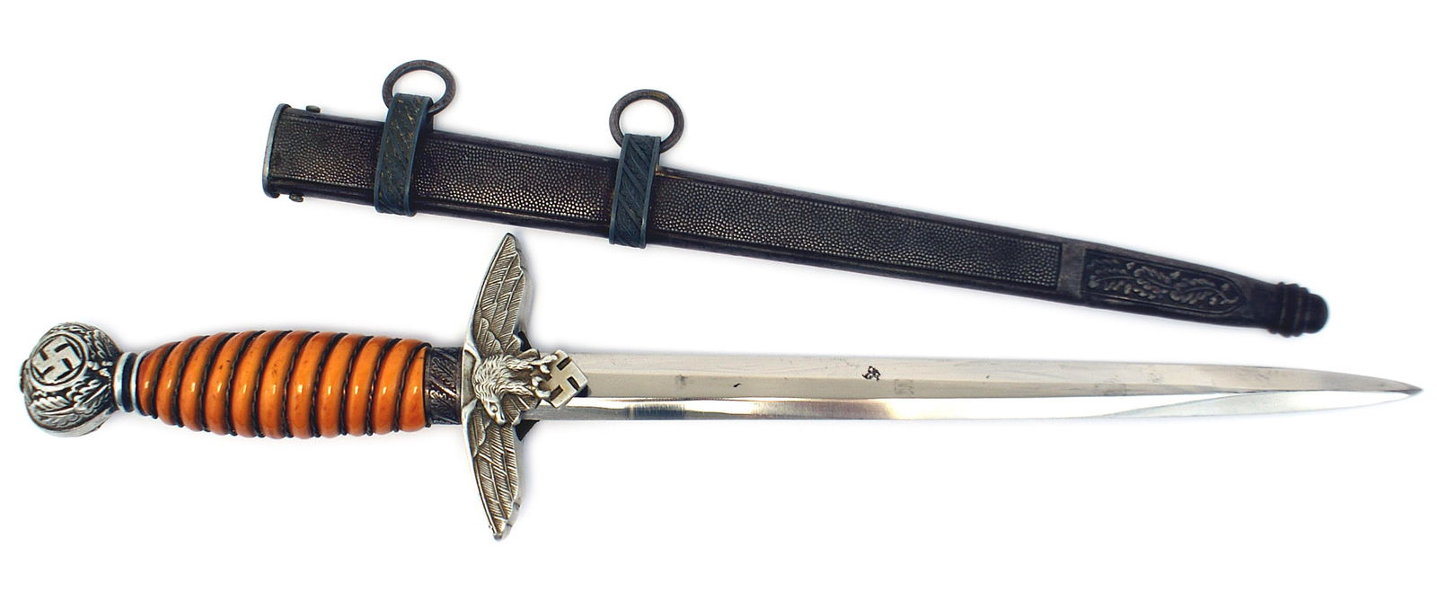 German WWII Luftwaffe 2nd Model dagger: D-014 Luftwaffe 2nd Model Officer's dagger. Aluminum oval pommel bearing oak leaves and a swastika, oak leaf ferrule and flying eagle/swastika crossguard. Wire wrapped orange grip. 10 1/8" clean blade