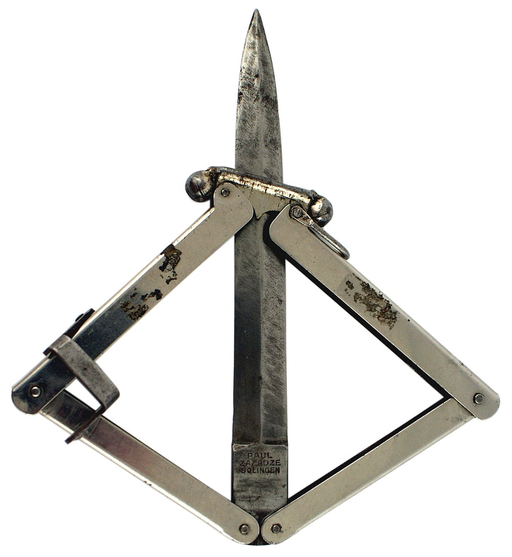 German post-war folding pocket knife: D-027 German post-war folding "butterfly" pocket knife. "Polished" steel four-section 6 1/8" hinged handle". When the clasp in the middle is pulled forward and the two sides are extended away from the