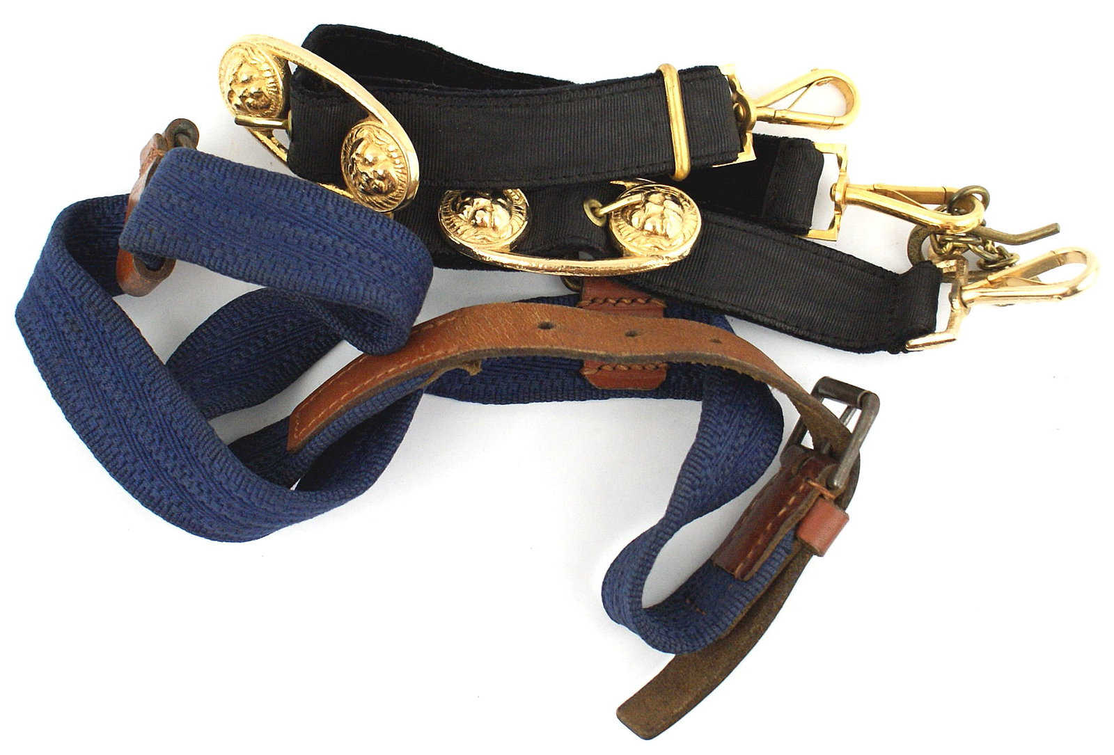 German WWII Navy composite set dagger hangers: D-071 German WWII Navy composite set of belt and dagger hangers. The blue cloth belt with leather tabs/ "O" rings and adjustable belt/open buckle appears to be original. However the gold lionhead buck