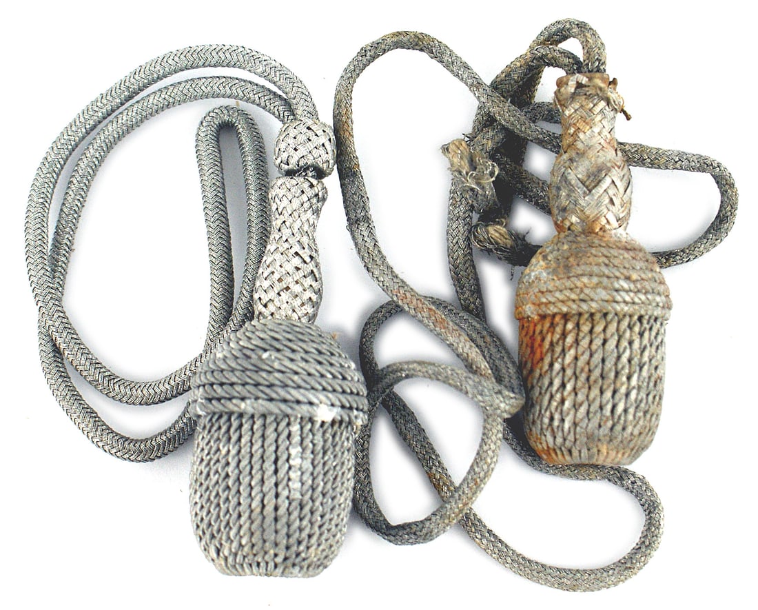 Lot of 2 German WWII dagger portopees Navy: D-072 Lot of 2 German WWII dagger portopees: (1) Navy, Silver, smaller knot. Cord well worn, III. (2) Unknown. Silver, short cord. II