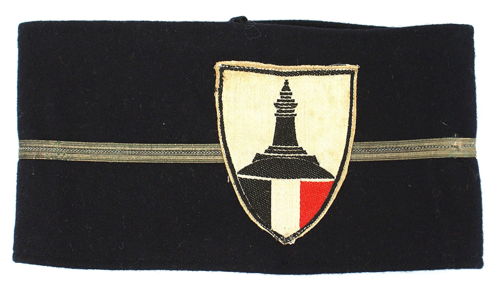 German War Veterans Organization armband: H-008 German 1930's Kyffhauserbund. War Veterans Organization arm band. Old style. Bevo embroidered war monument and national colors. Flat silver "tape" sewn through center - indicates an officer. II
