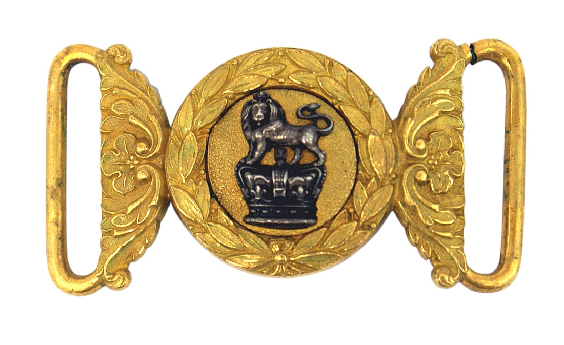 British Victorian officer belt buckle: H-101 British Victorian officer's belt buckle. Two-piece gilt floral buckle with an applied relief silver lion standing on a crown. Excellent condition with the exception of a split in metal of right