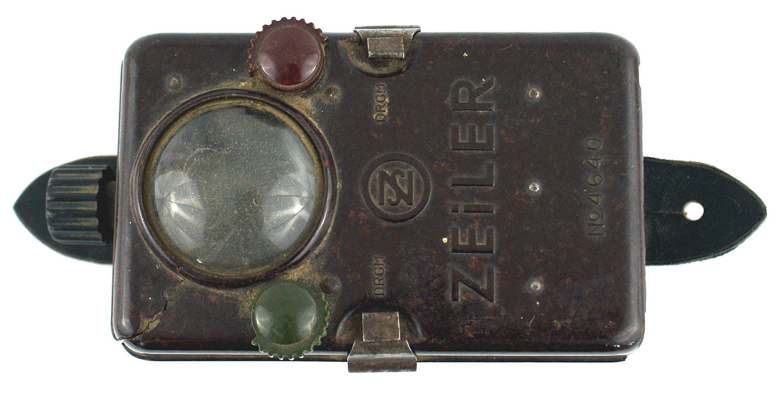 German WWII Army flashlight: N-005 German WWII Army flashlight. 4" x 3 1/2" x 1" bakelite "box" with a bubble prism, buttons to turn the colors (red and green) and button top to control the light intensity. Two metal arms hold li