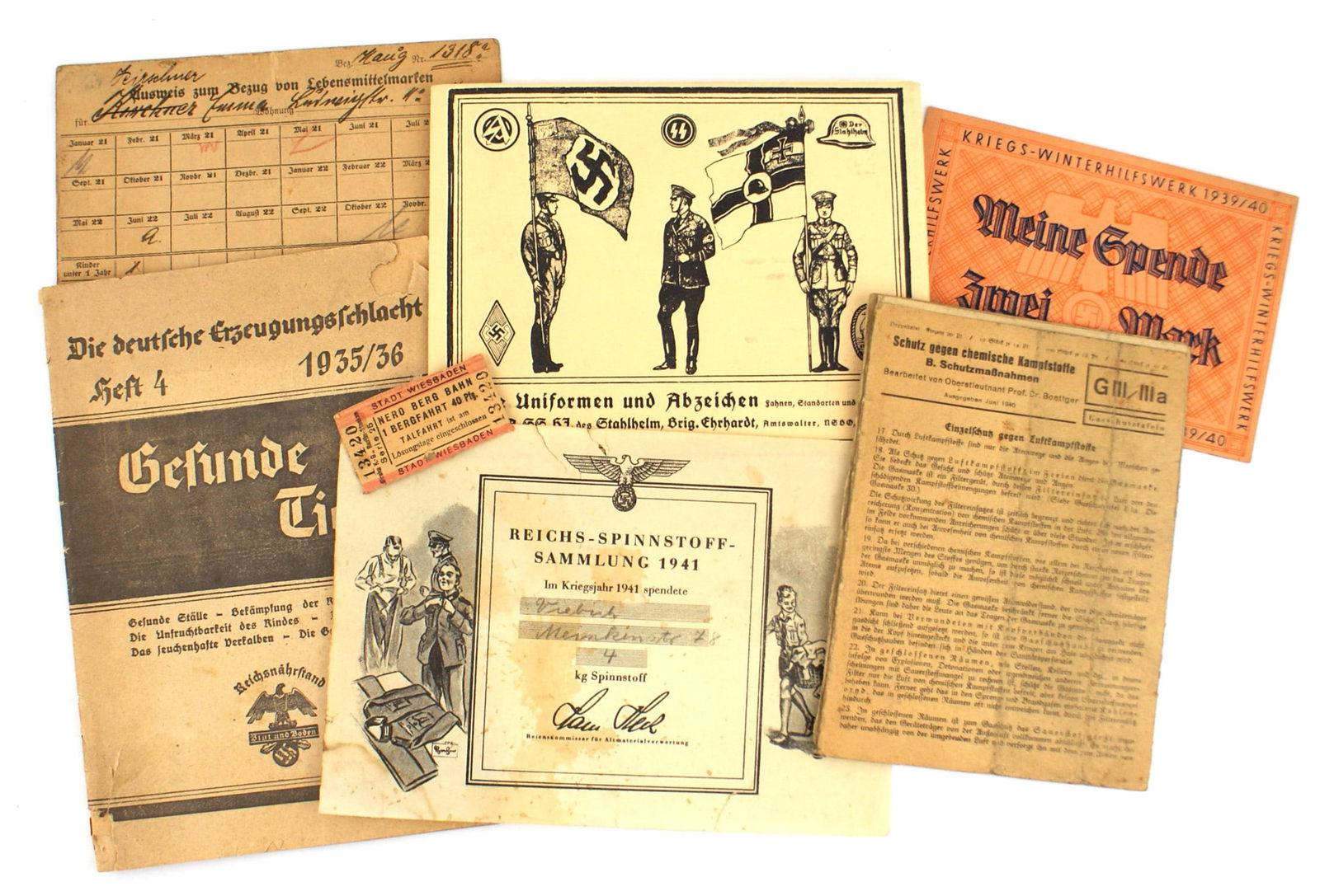 German WWII ephemera booklet ticket ration card: Q-003 Lot of German Third Reich ephemera: (1) Gefunde Tiere. 1935/36 Reichsnahrstand booklet. (2) Wiesbaden Berg Bahn ticket. (4) Receipt for donating clothing. (5) Wurzburg ration card for meat. (6)