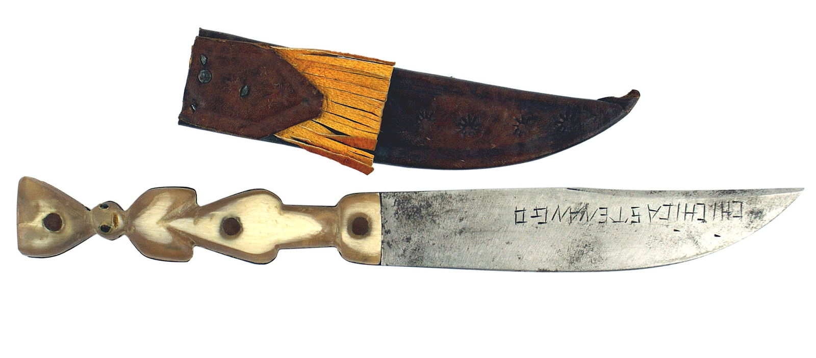 Guatemalan souvenir knife: R-014 Guatemalan souvenir knife. Overall 7 1/2" with a 4" blade is engraved "CHICHCASTENANGO". Bone grip is shaped to the silhouette of a peasant woman walking with a basket on her head. Brown leather