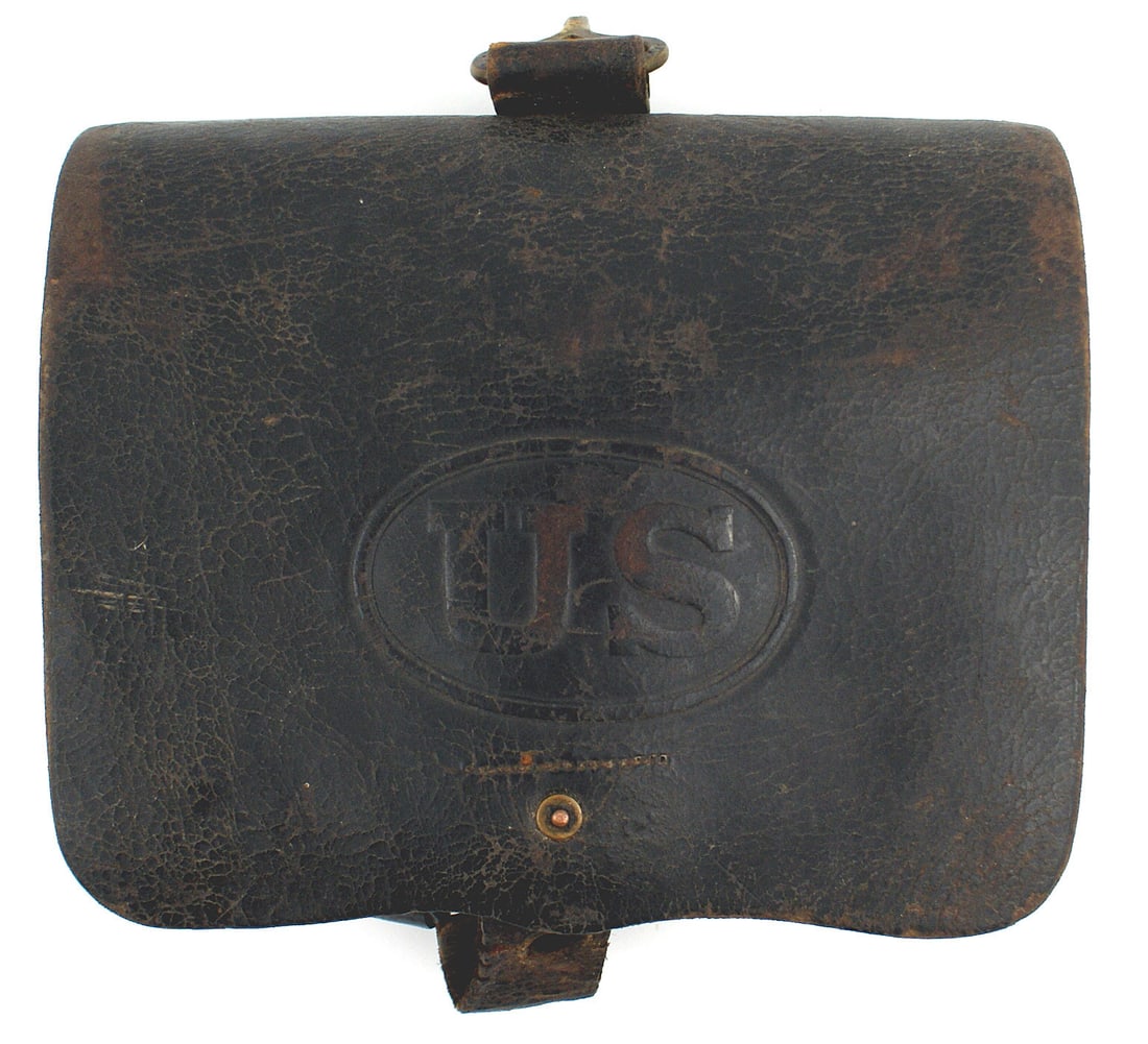 US M1855 58 cal. Cartridge box: K-033 US M 1855 58 cal. Cartridge box. Relief embossed oval with "US" on the 6 1/2" x 8" black leather flap. Inside flap marked "E. METZGER - PHILA" and "H.H. HARTZELL - US ORD. DEPT. ...". Two belt l