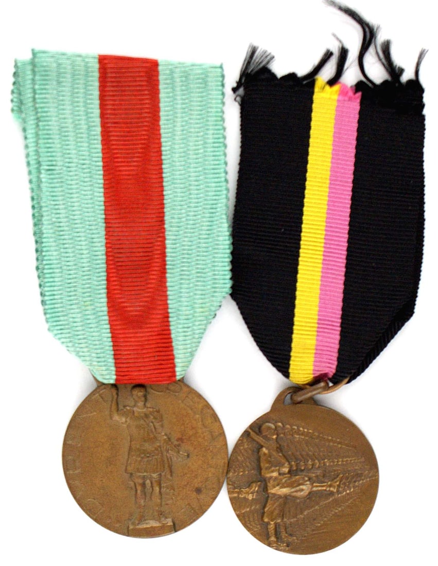 Lot of 2 Italian Fascist medals MVSN: B-106 Lot of 2 Italian Fascist medals: (1) Bronze - relief "goose stepping" line of helmeted soldiers. Reverse - relief fasces surrounded by drawn bayonets and "MVSN" heading a paragraph praising Muss