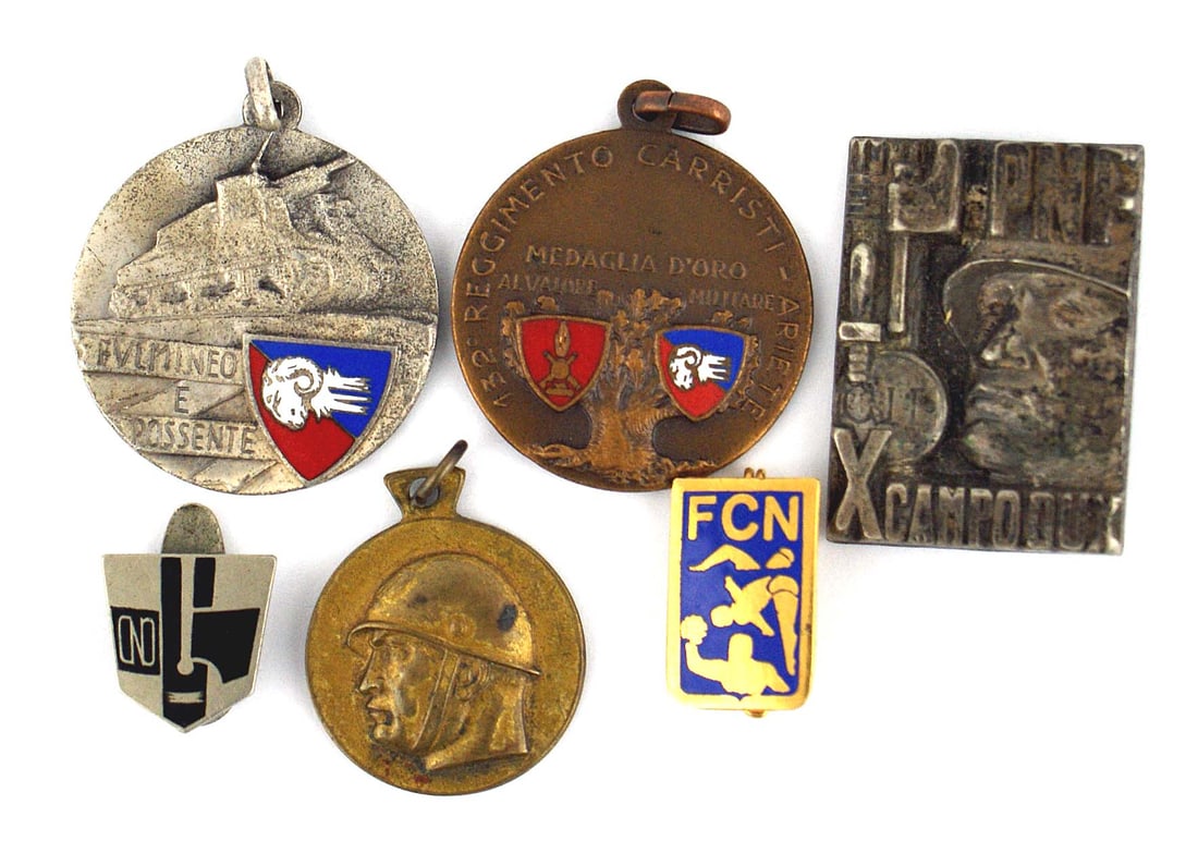 Lot of 6 Fascist Italian insignia badges: B-108 Lot of 6 Fascist Italian insignia: (1) Age darkened silver badge - relief helmeted soldier, "PNF" (National Fascist Party), Fasces with shield marked "GIL" (Youth Corps) and "X CAMPO DUX". Pin-b