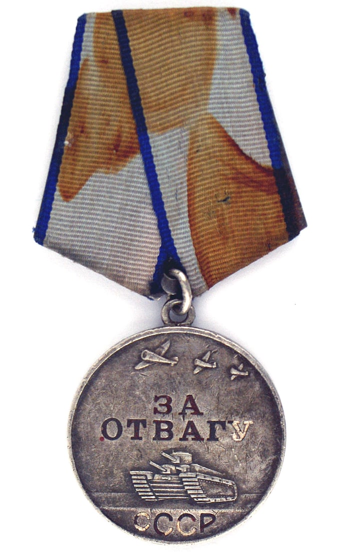 Russian medal MERITORIOUS SERVICE IN BATTLE (1 of 2)