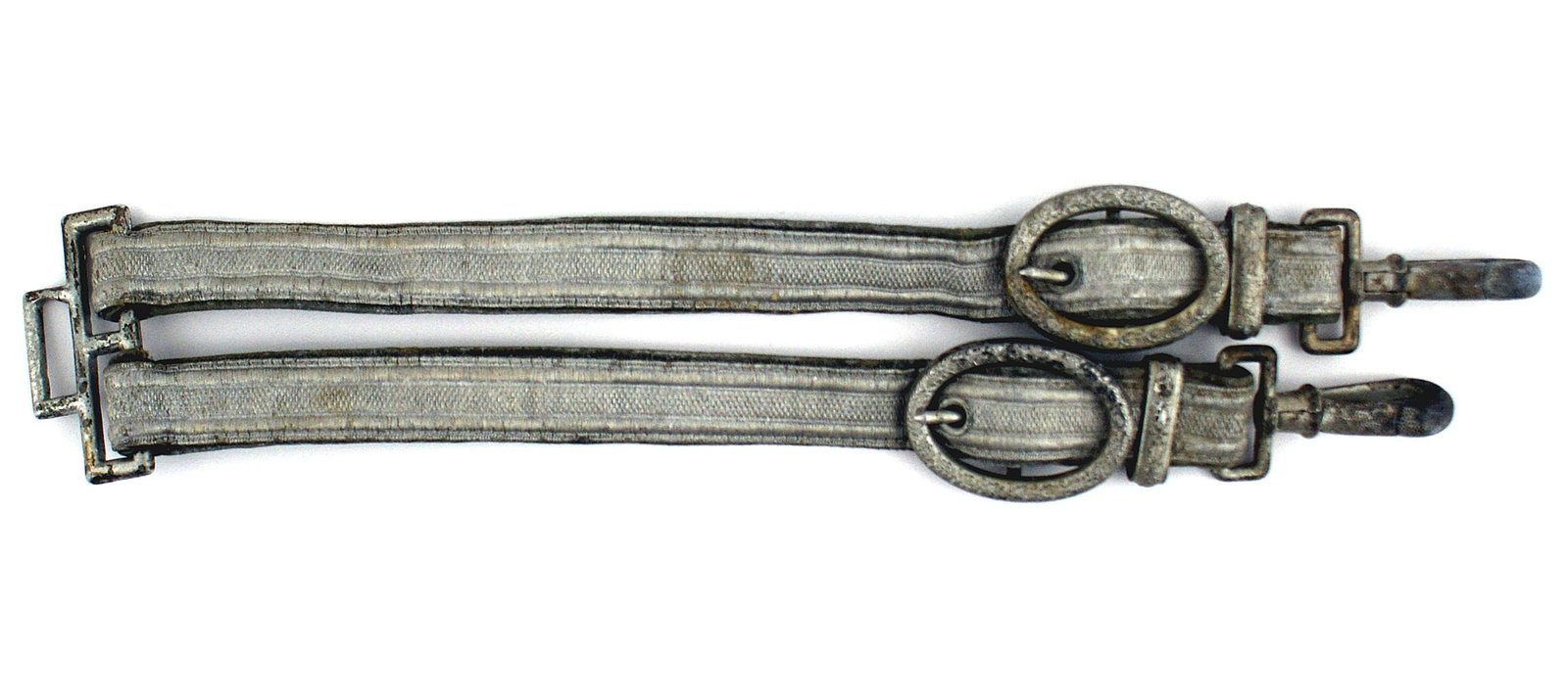 German WWII Army officer dagger hangers: D-026 German WWII Army officer dagger hangers. Flat silver bullion designed straps with green velvet backing (some age wear). Oak leaves decorated buckles and slides, and pebbled snap hooks. II