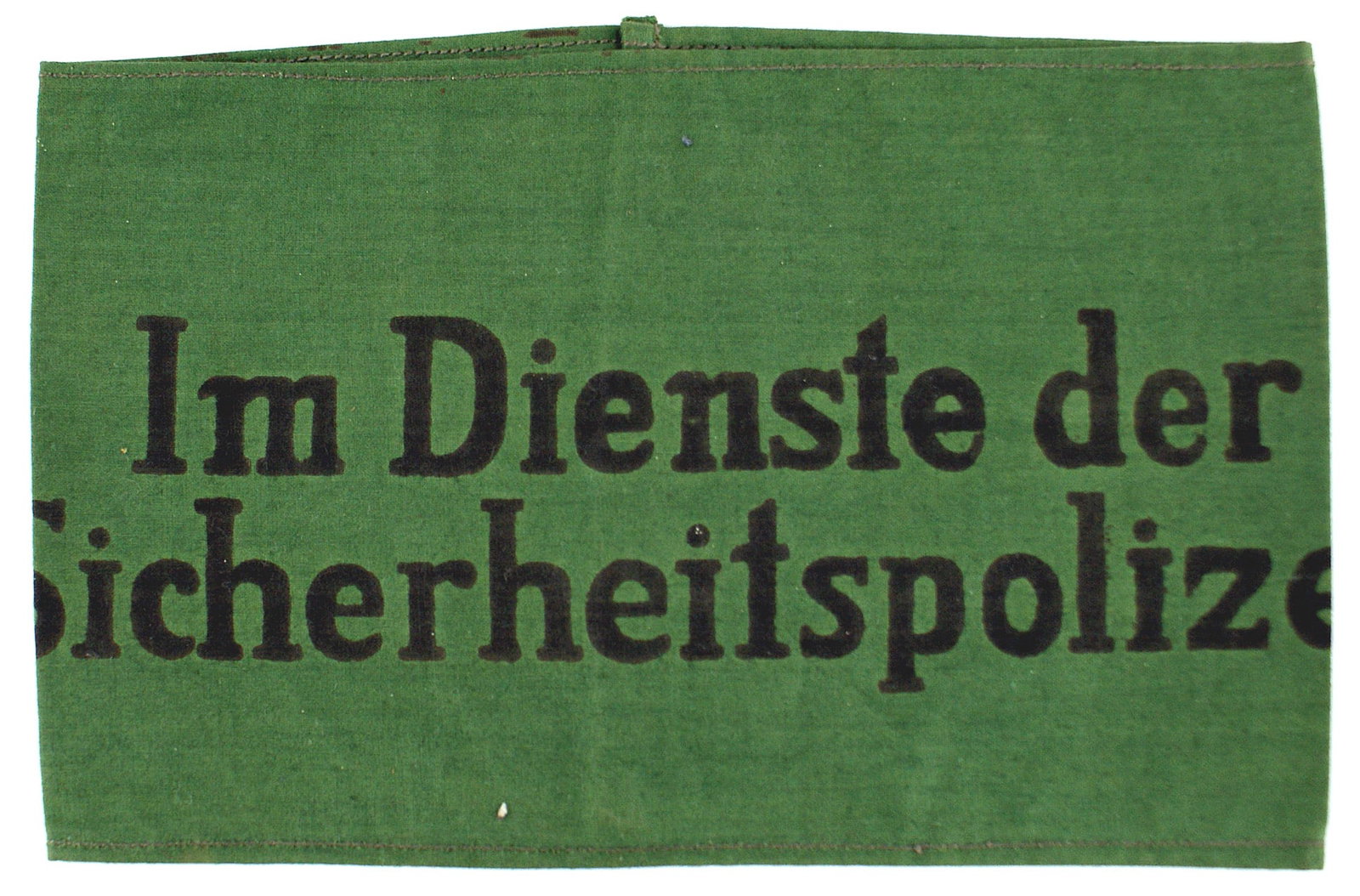 German WWII armband Sicherheitspolizei: H-020 German WWII armband "Im Dienste der Sicherheitspolizei" in black print on a green band. Worn by individuals who saw "Service with the Security Police". II