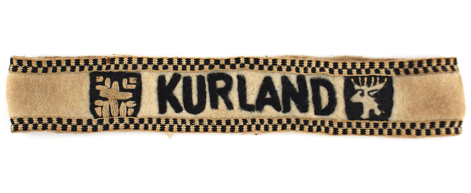German WWII KURLAND cufftitle: H-041 German WWII "KURLAND" cufftitle, instituted for all members of the Kurland Army who were surrounded and under siege by the Soviet forces. This cufftitle was made by a large number of Latvian tai