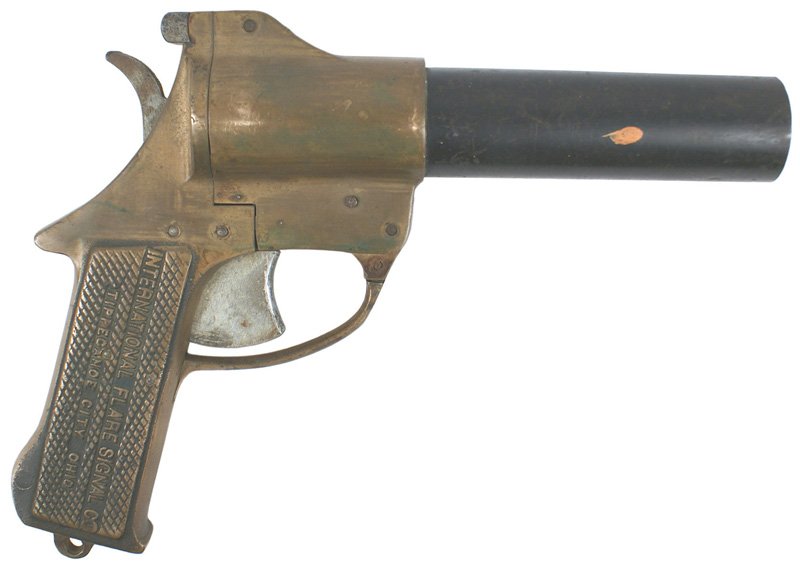 U.S. WWII flare pistol: M-40 U.S. WWII flare pistol, blued steel barrel. Brass frame and grips marked "INTERNATIONAL FLARE SIGNAL CO..." Dated "JUN '44". Serial number "26860". II