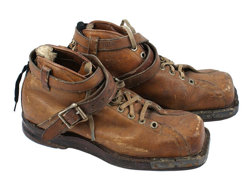 U.S. WWII Mt. Troops ski boots: N-38 Mt. Troops ski boots. Brown ankle high with support straps and buckles. Thick leather soles and grooved heels (to accommodate ski bindings). Bottom marked "15". Size 9 1/2. About II