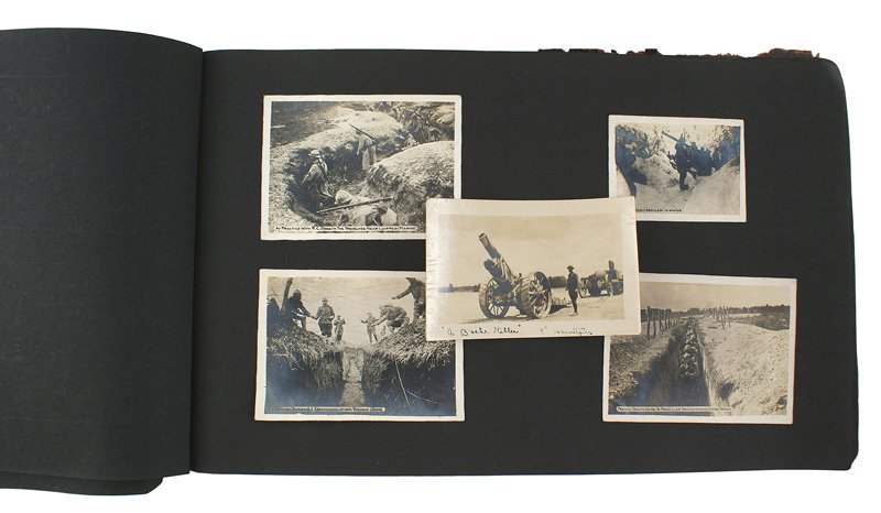 U.S. WWI photo album: L-14 WWI photo album. 182 photos of troops aboard ship, camp life, views of French landmarks, allied leaders, trench warfare, use of aircraft, tanks, artillery, combat damage, battlefield casualties, 