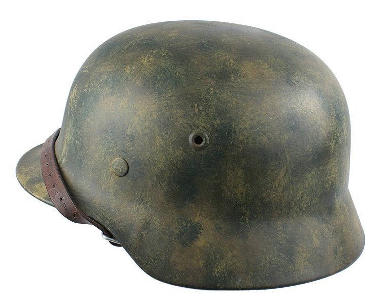 German WWII Army M1940 camo helmet: E-35 German WWII Army M1940 camouflage helmet . Smooth finish "patchy" green/olive/subdued brown pattern. Chinstrap is maker marked and dated 1940. Leather liner shows some wear. II