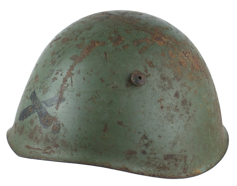 Italian WWII Artillery steel helmet: E-111 Italian WWII Artillery steel helmet. Original green finish with painted crossed cannons. Shows scratches and some rust spots. Original liner and chinstrap are worn and soiled. III